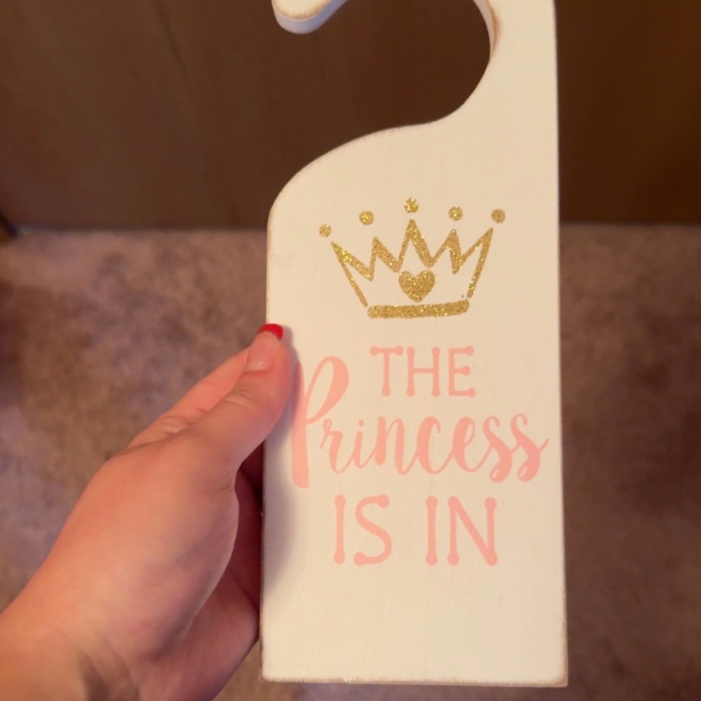 White Door Hanger with Gold Crown and Pink Text